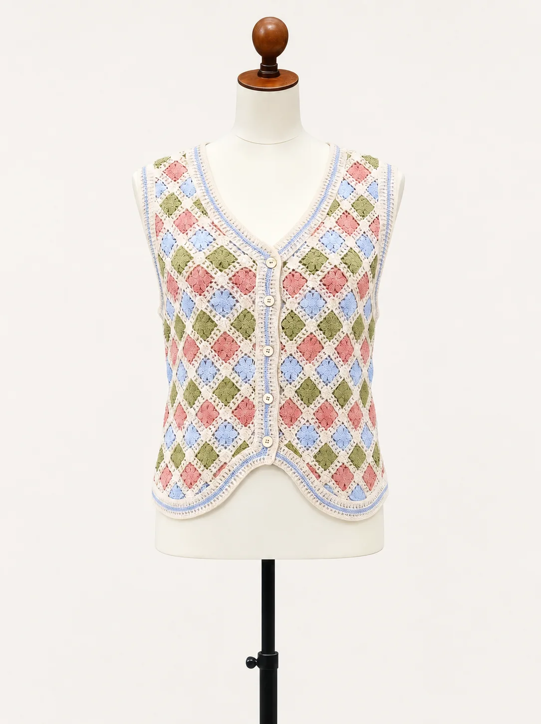 Wholesale pastel argyle crochet-look button vest for OEM and private label production